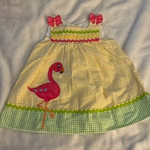 Little girl yellow dress with pink flamingo. 12m